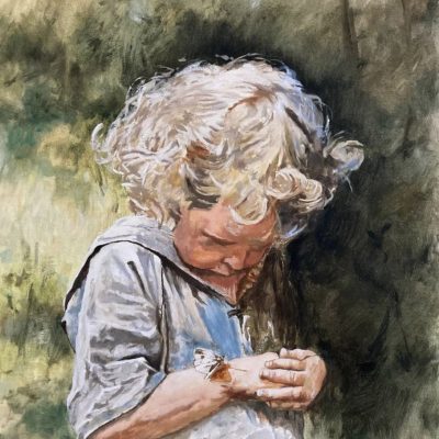Little girl looking at a butterfly